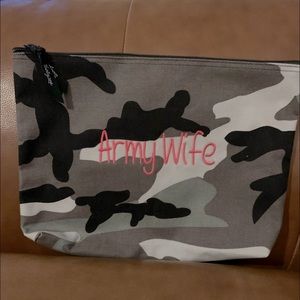 Thirty one camo zipper pouch.  Great for travel.
